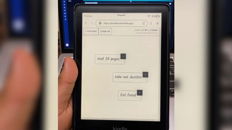 Close-up of a Kindle with a whiteboard website on display