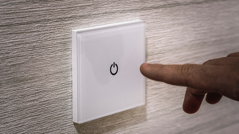 finger pushing button 