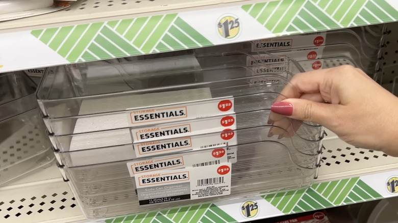 Dollar Tree soda can organizers stacked on a store shelf