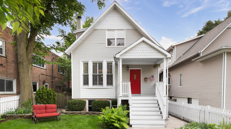 white home with red door