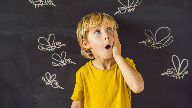 boy with mosquito drawings