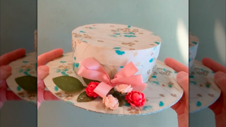DIY hat box with floral decorative paper.