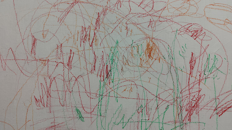 Crayon scribbles on the wall
