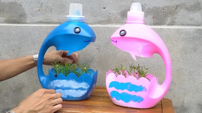 Dolphin themed planters made from detergent bottles