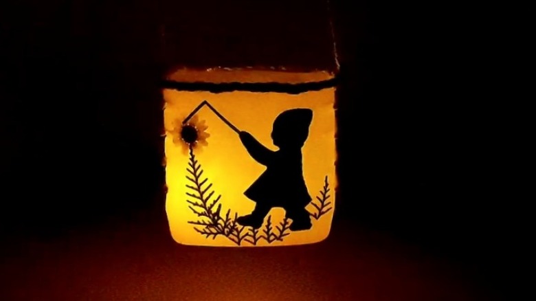 Glowing night light with design made from a detergent bottle