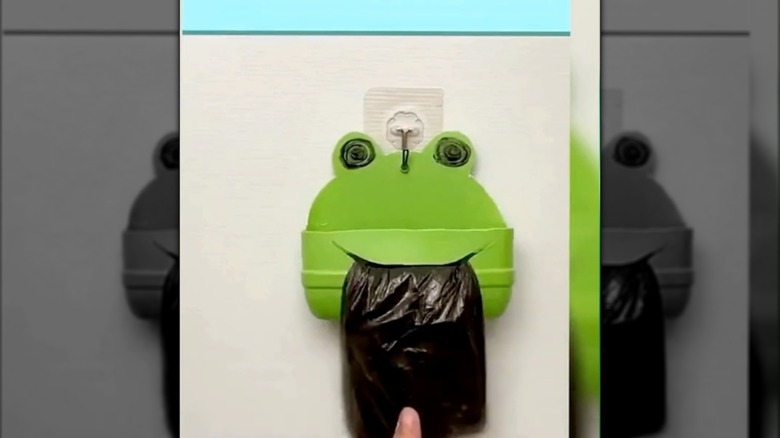 Frog themed bag holder from an old detergent bottle