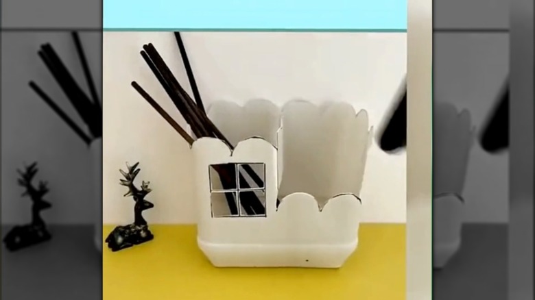 DIY utensil organizer made from a detergent bottle