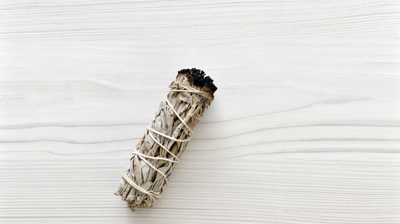 A dried sage bundle wrapped in string