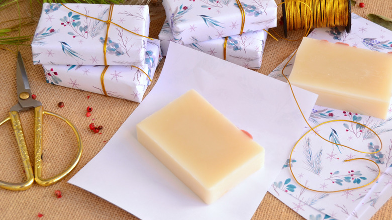 Homemade soap being wrapped in paper