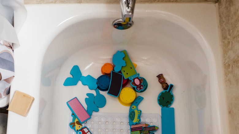 Kids' bath toys in tub