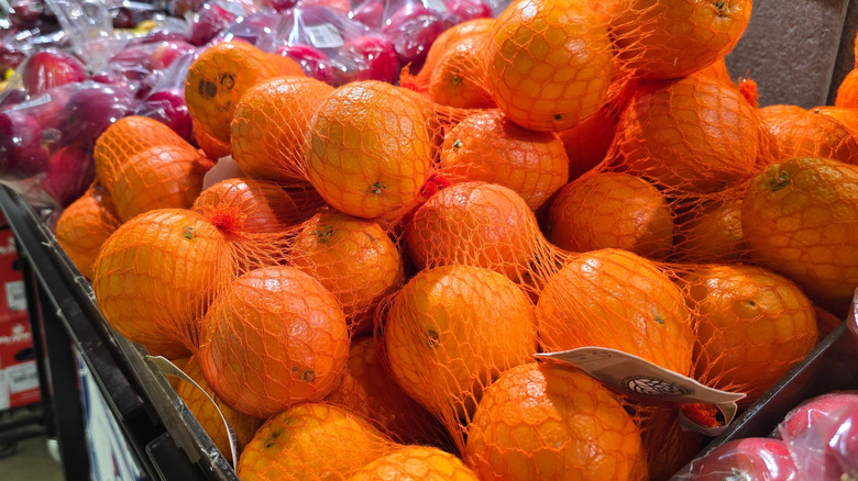 Oranges in mesh produce bags