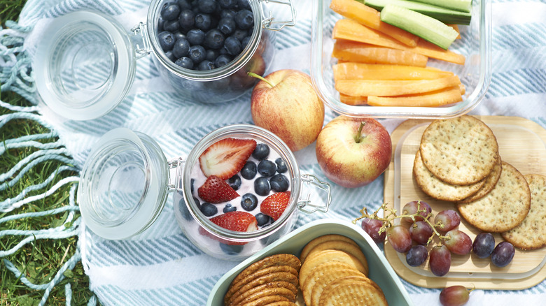 Picnic lunch spread out on a blanket