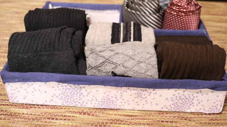Socks in storage basket with dividers