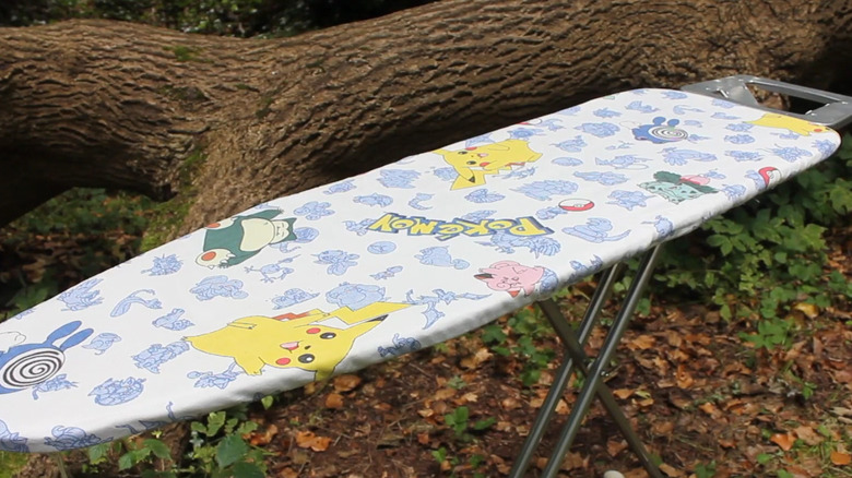 Ironing board with cover made from Pokemon bed sheet