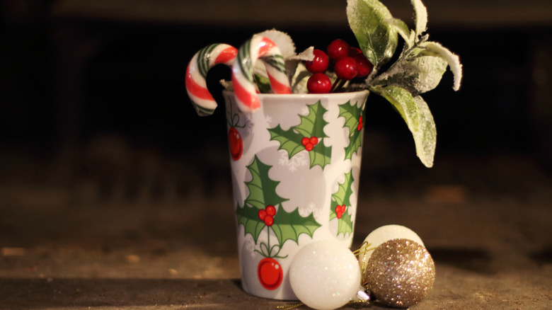 A coffee mug being used as festive decor