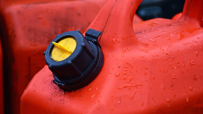 An old red gas can with the lid closed