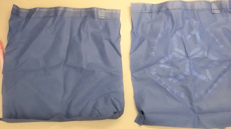 Cutting cloth to sew cushion covers