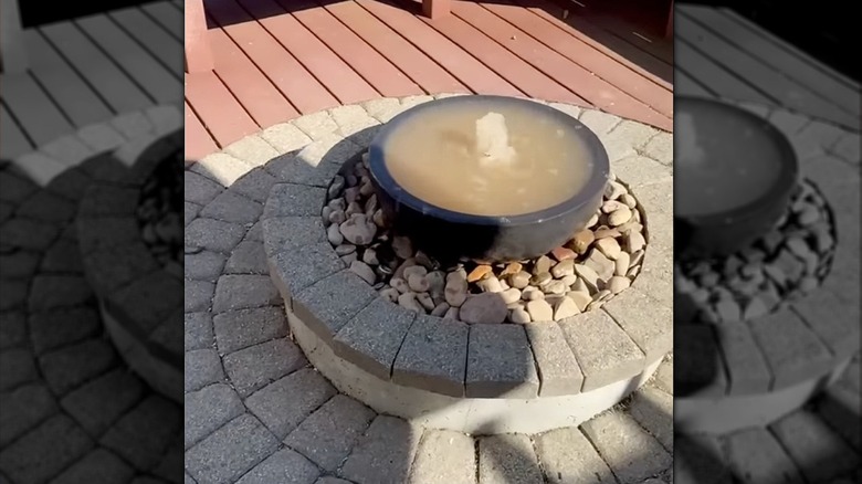 DIY water feature made from an old fire pit