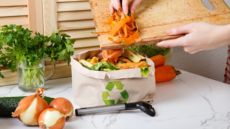 Saving cooking scraps in recyclable bag