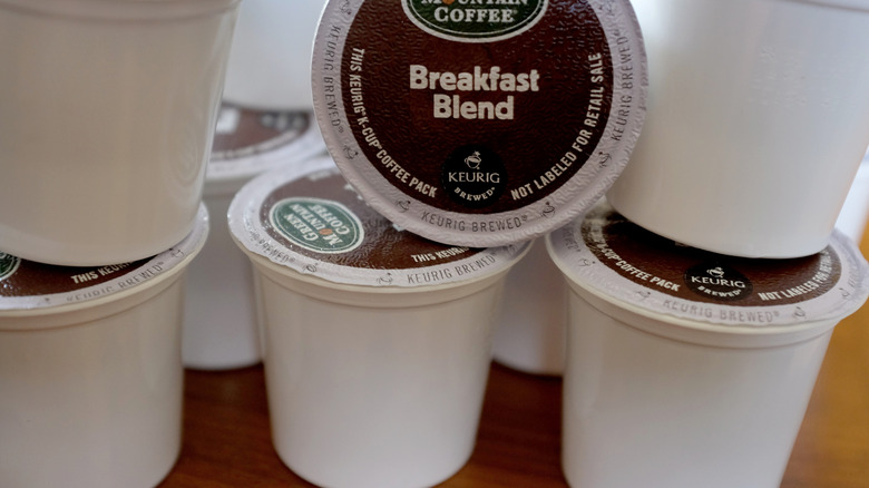 white coffee pods stacked