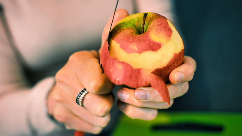 close up peeling apple