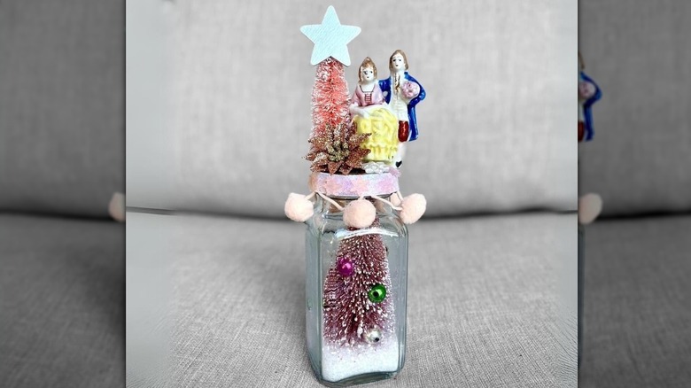 Jar with Christmas accents inside and on top