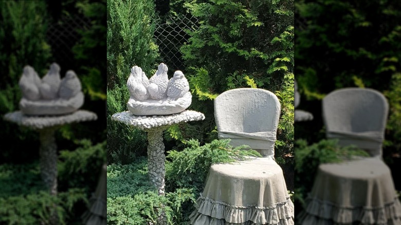 Old fabric that has been turned into garden sculpture using concrete