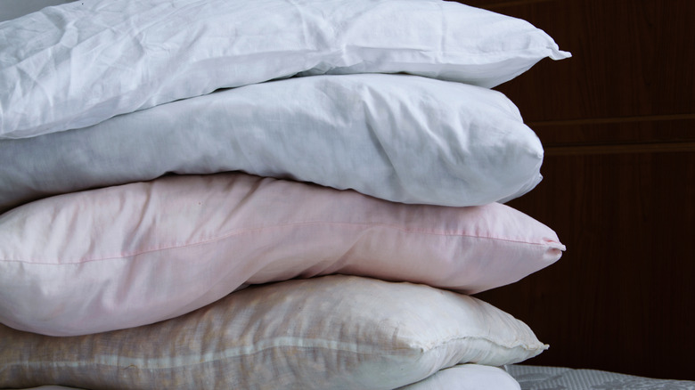 old dingy pillows on mattress