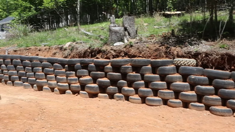 YouTuber SethCraft 's retaining wall made of old tires