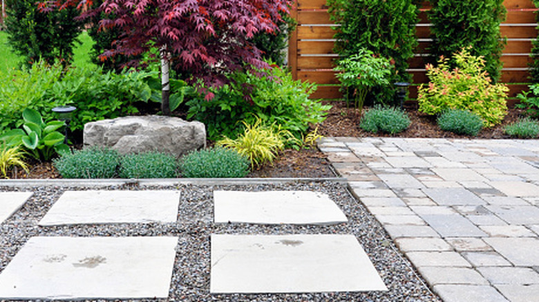 Pathway and patio made with different sized concrete pavers