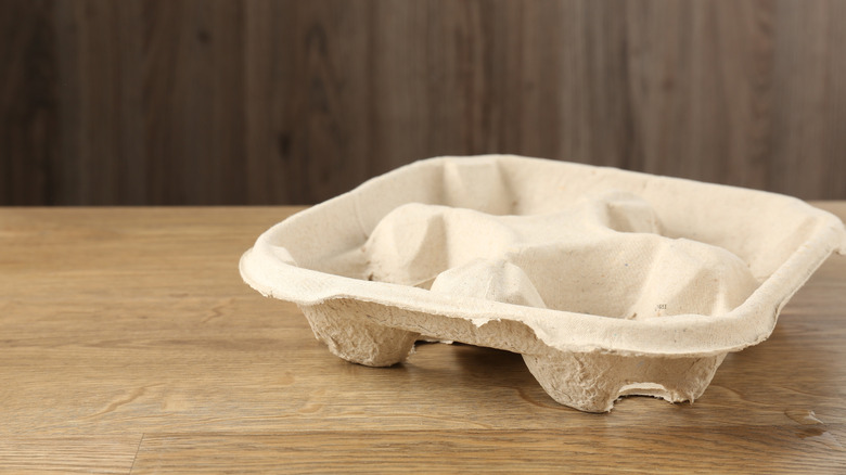 empty cupholder on wooden table