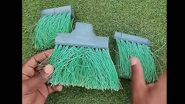 A broom cut into a multi-purpose tool.