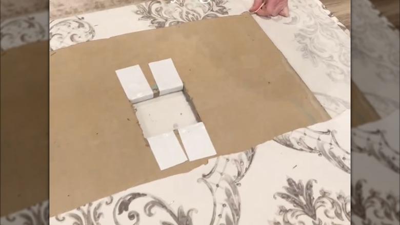 screenshot of person making backsplash