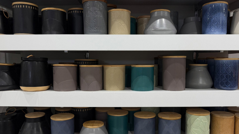 Ceramic jars on shelves at a store