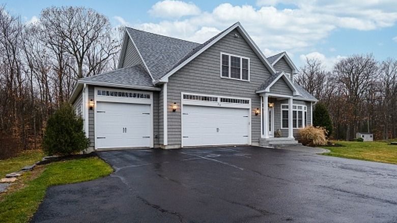 A home with an asphalt driveway.