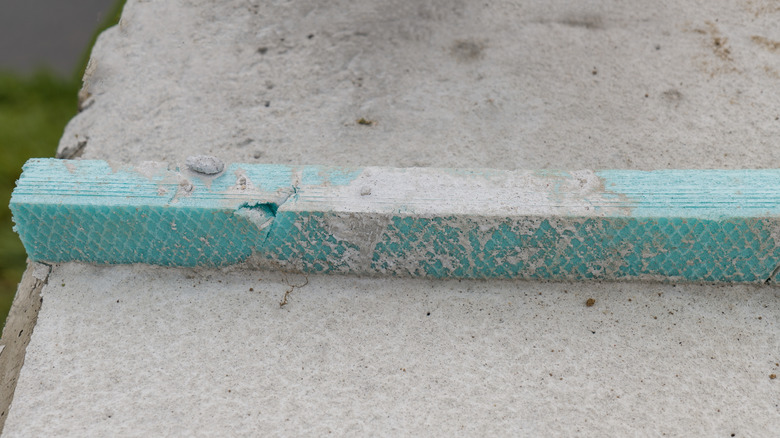 Polystyrene added to concrete to create an isolation joint.