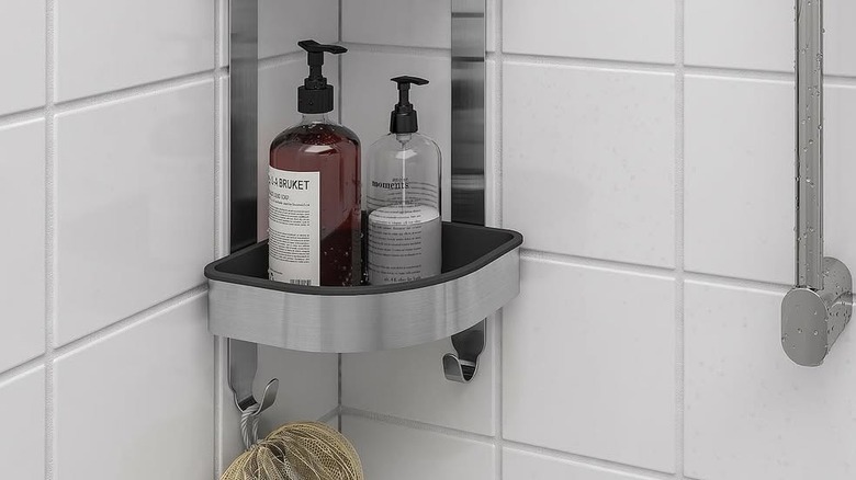 An IKEA BROGRUND corner wall unit hanging in a shower.