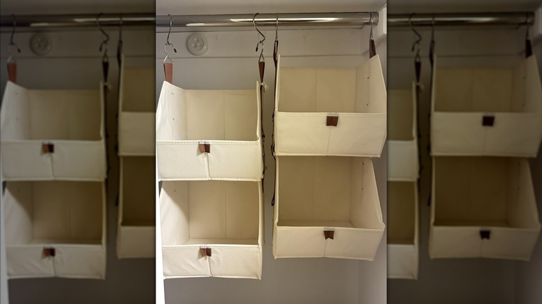 empty hanging closet modular storage bins on a closet rail