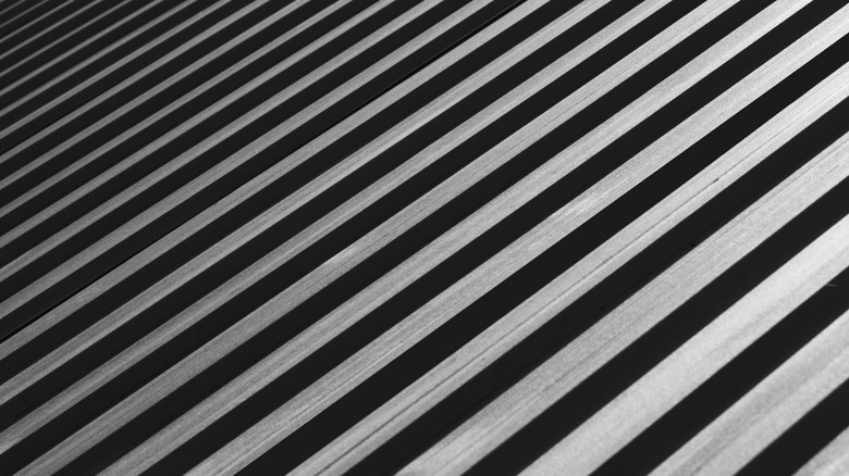 Black corrugated aluminum roofing close-up