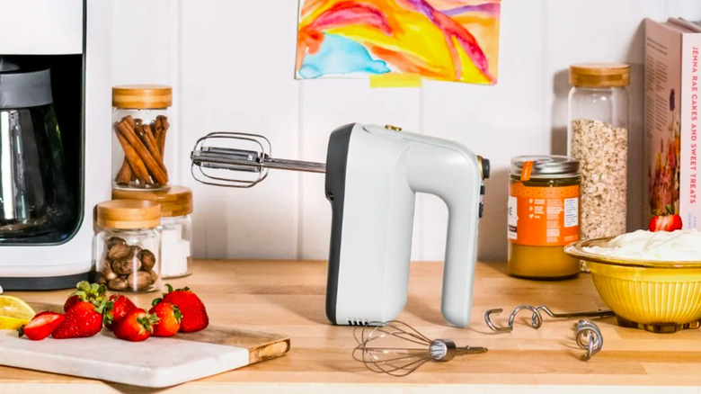 A hand mixer on a kitchen counter.