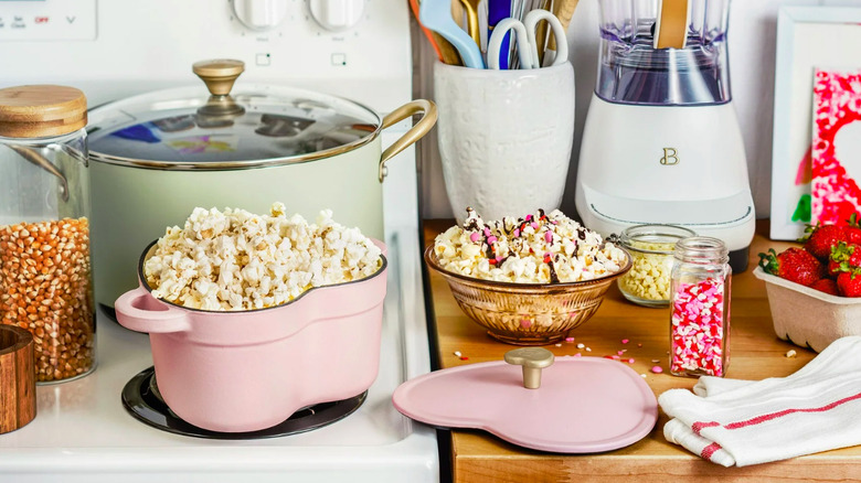 Stovetop with kitchen items on it.