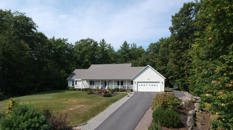 Aerial photo of long tarmac driveway