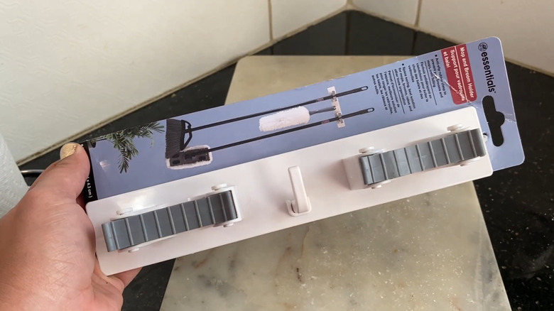 Overview of Dollar Tree's broom and mop holder