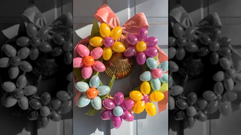 An Easter wreath decorated with plastic egg flowers