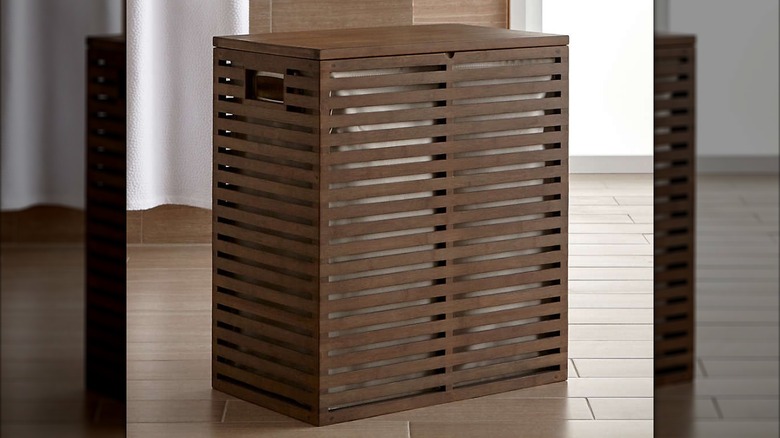 A bamboo laundry hamper from Crate & Barrel.