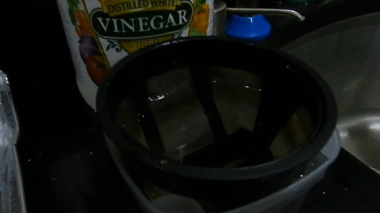 Coffee filter dipped in distilled white vinegar
