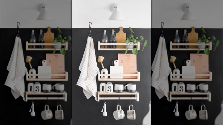 Three spice racks mounted on the outside of a cabinet for beautiful storage