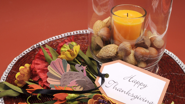 Hurricane vase used for fall decoration