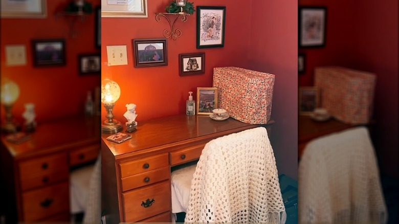 Desk with a blanket-covered office chair