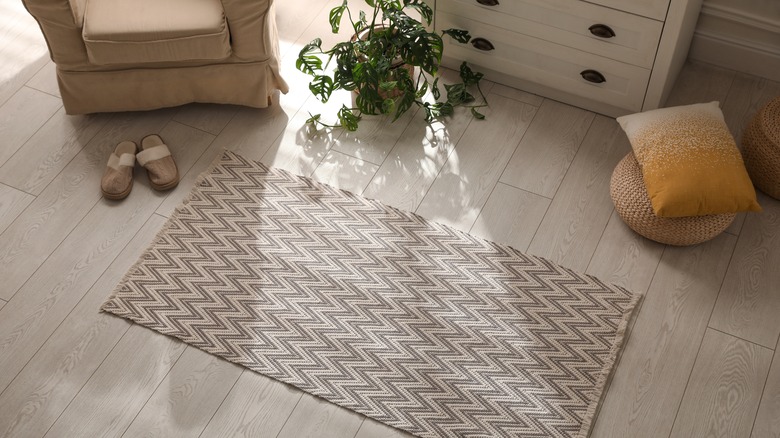 A rug on a floor 